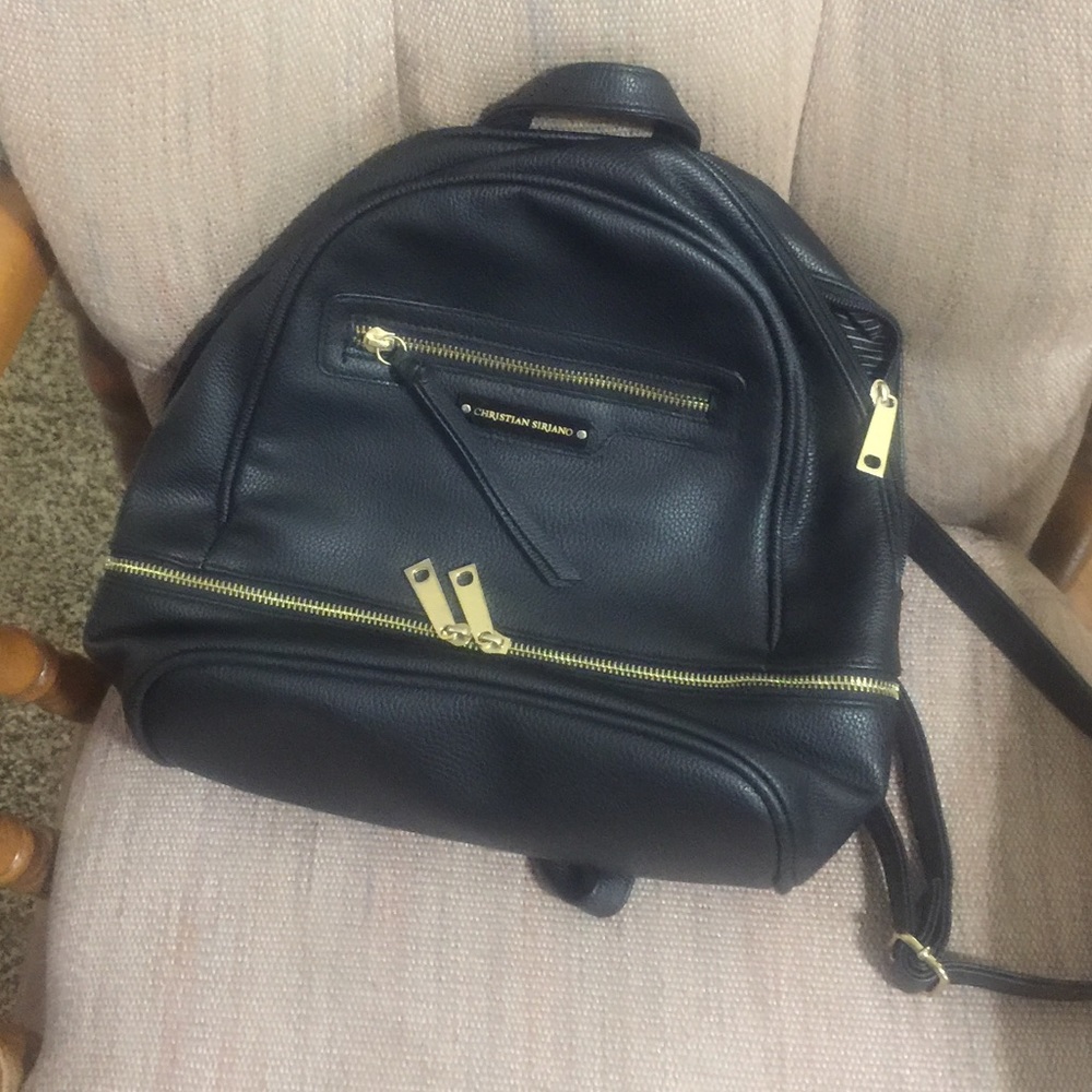 Christian Siriano backpack black with gold accents